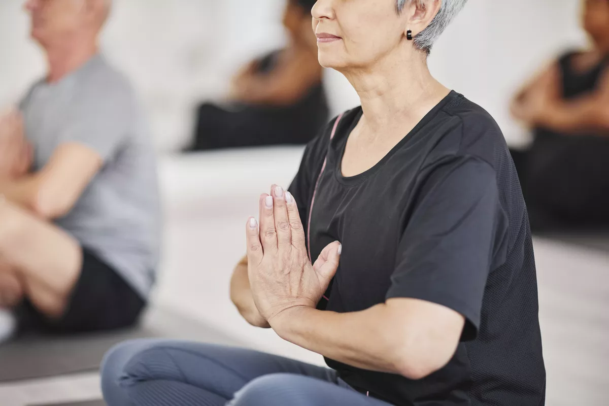 Yoga-Session an Bord - © Getty Images/iStockphoto